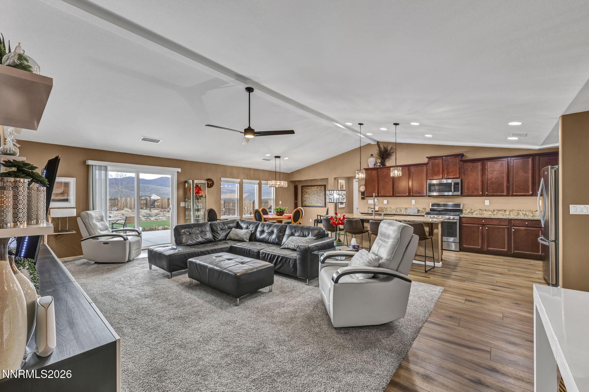 148 Snake Road Dayton, NV 89403 - Photo 9 of 57 a living room with furniture kitchen view and a large window