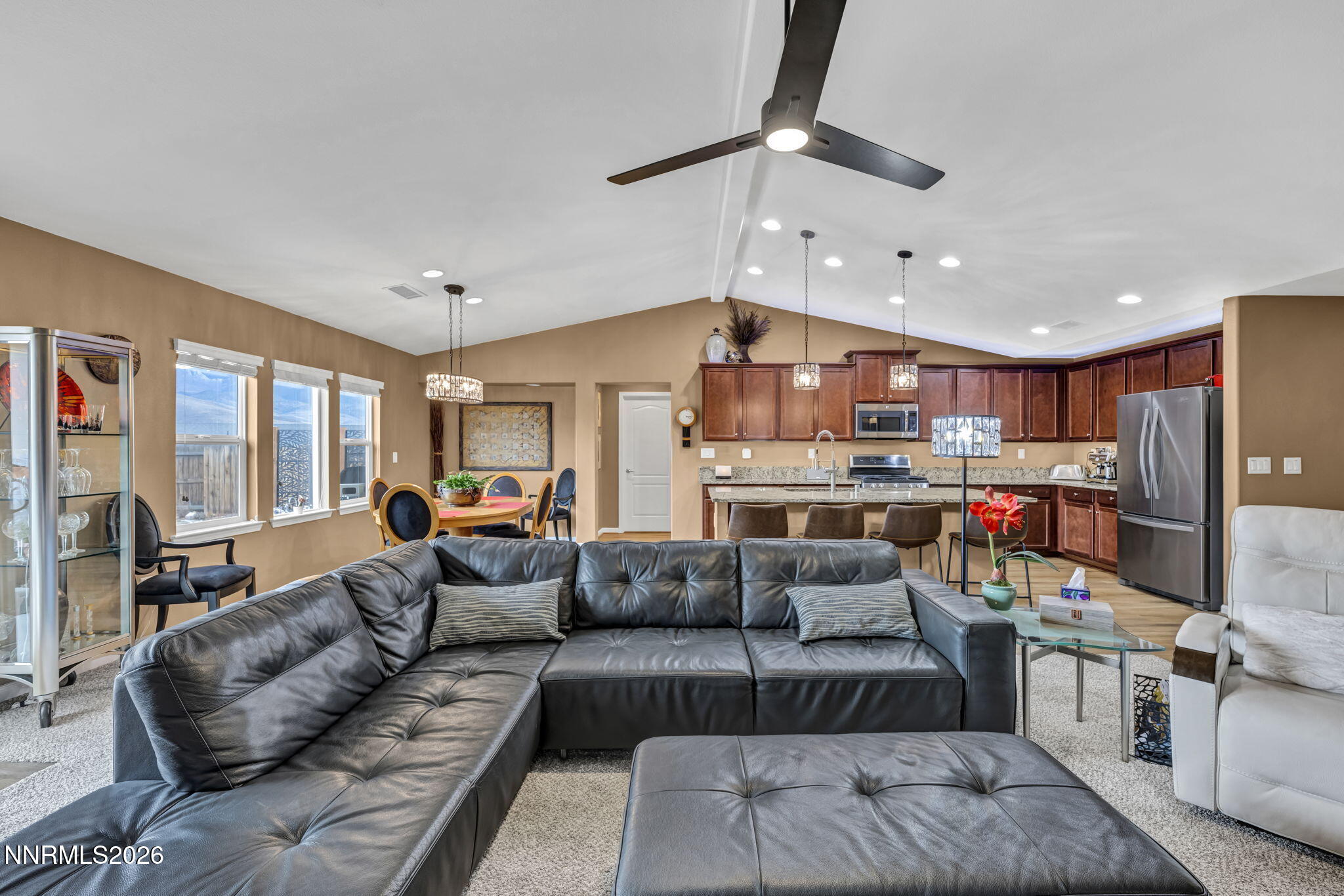 148 Snake Road Dayton, NV 89403 - Photo 10 of 57 a living room with furniture kitchen and a table