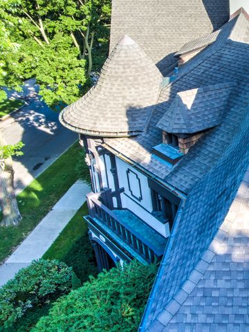 a view of a backyard with sitting area