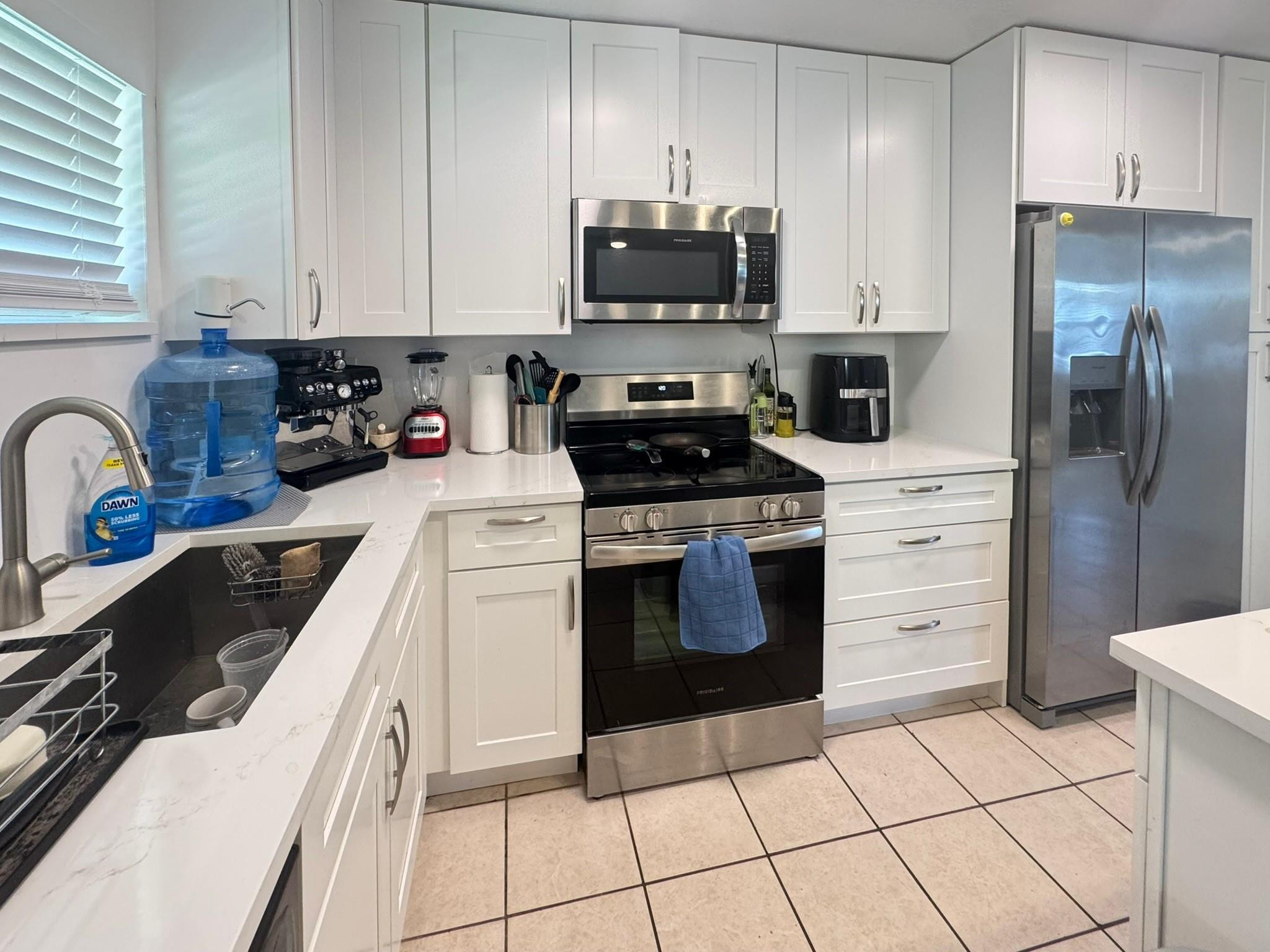 151 Southwest 15th Street, Unit B Pompano Beach, FL 33060 - Photo 5 of 15 Renovated kitchen