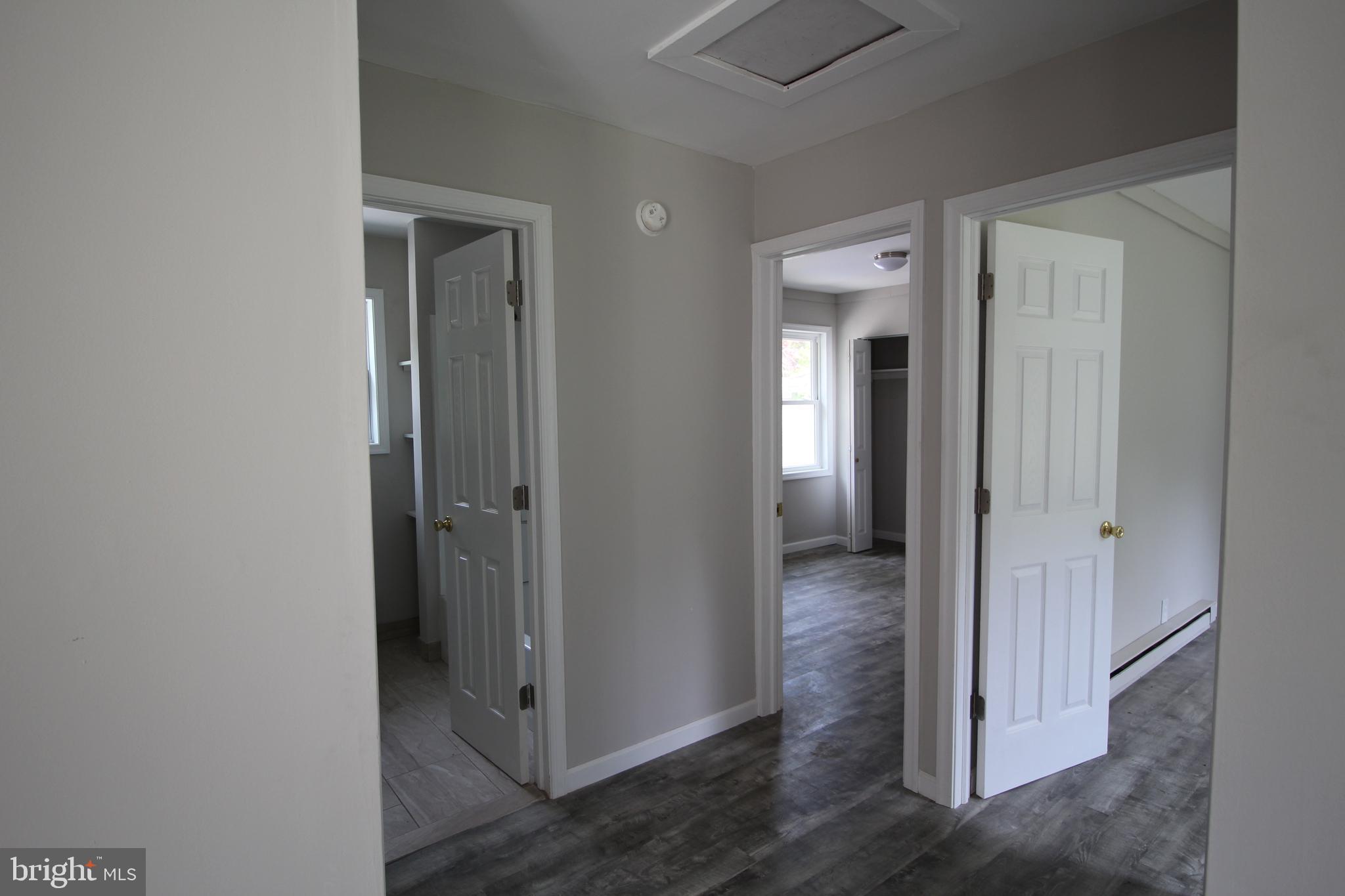 424 Trenton Road Browns Mills, NJ 08015 - Photo 23 of 109 a view of a hallway with wooden floor