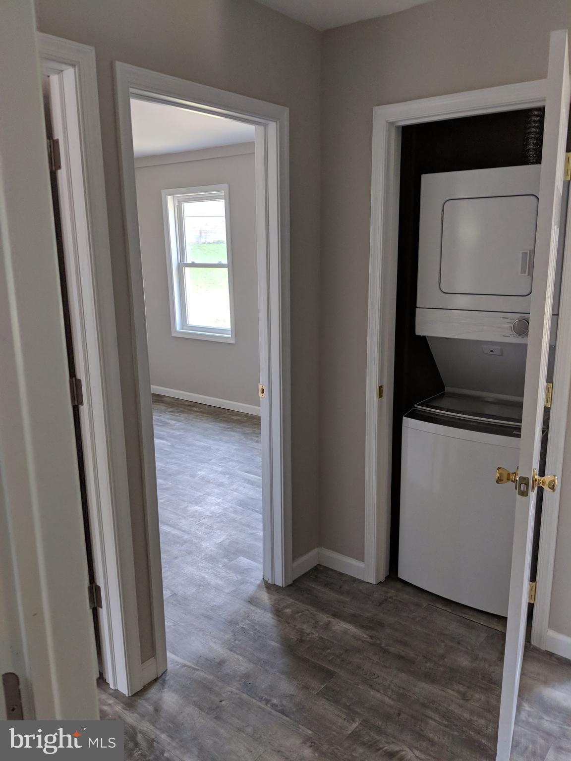 424 Trenton Road Browns Mills, NJ 08015 - Photo 32 of 109 a view of a hallway with wooden floor