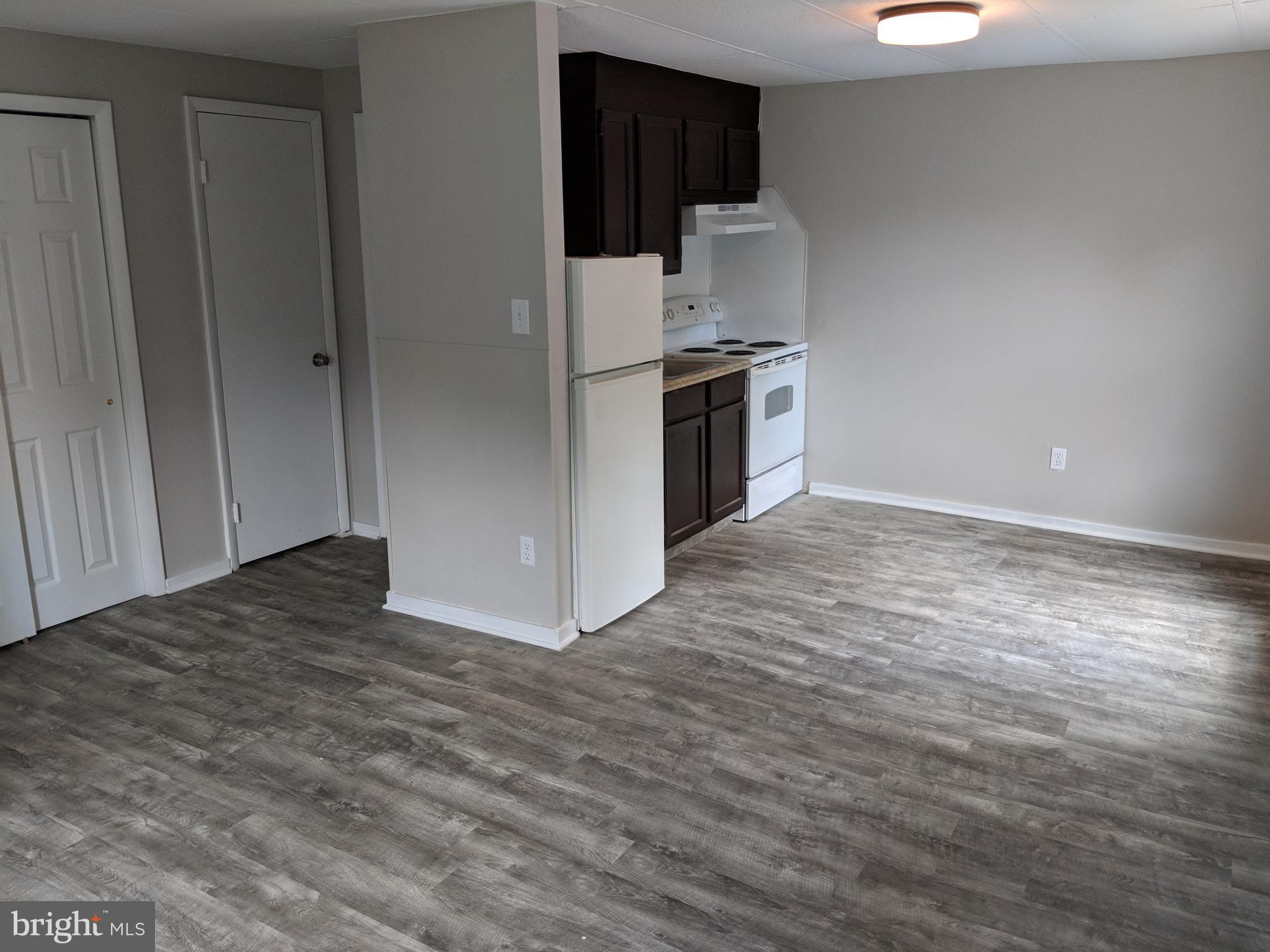 424 Trenton Road Browns Mills, NJ 08015 - Photo 4 of 109 a kitchen with granite countertop a stove and a sink