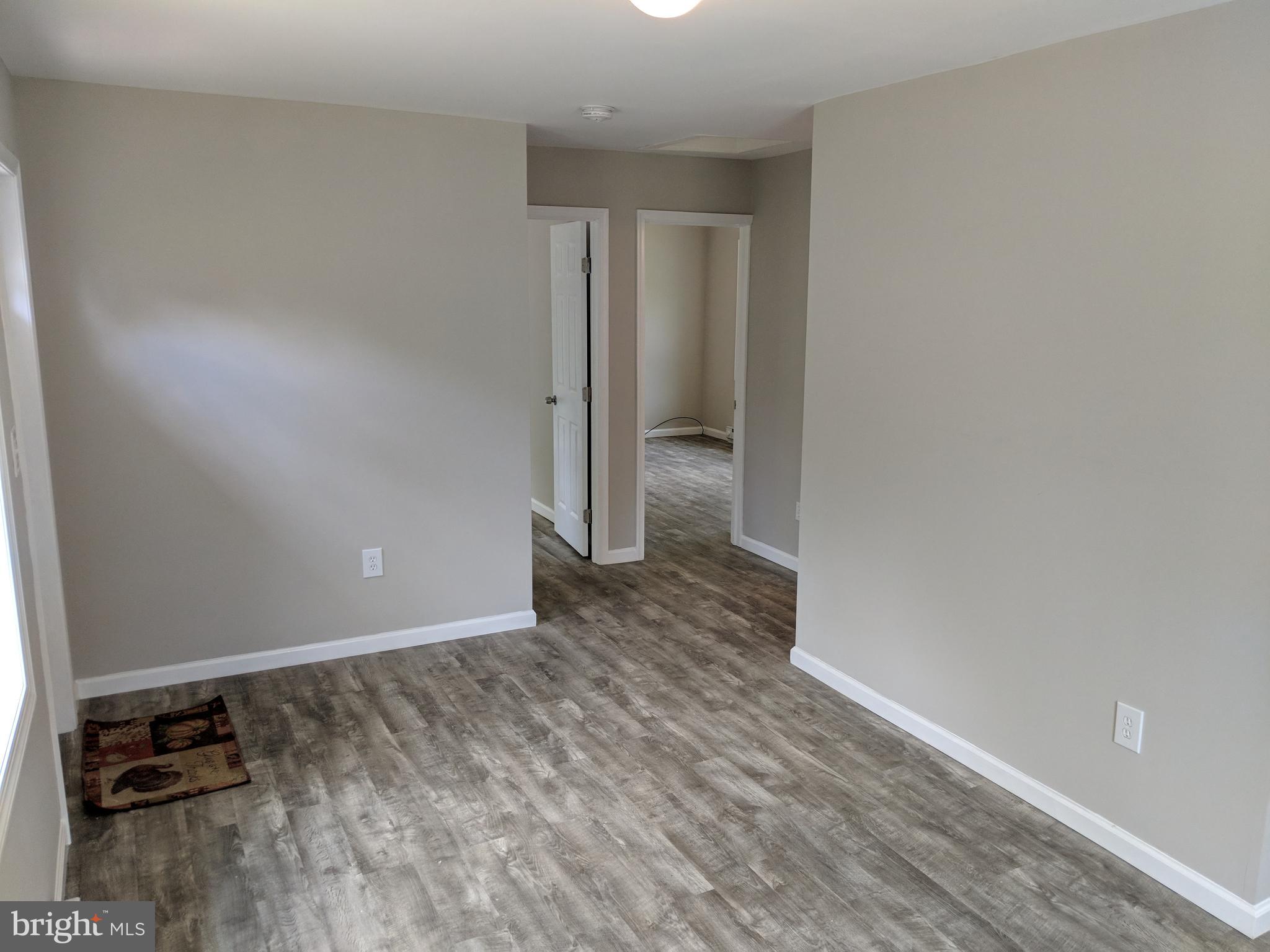 424 Trenton Road Browns Mills, NJ 08015 - Photo 45 of 109 a view of a room with wooden floor and a sink