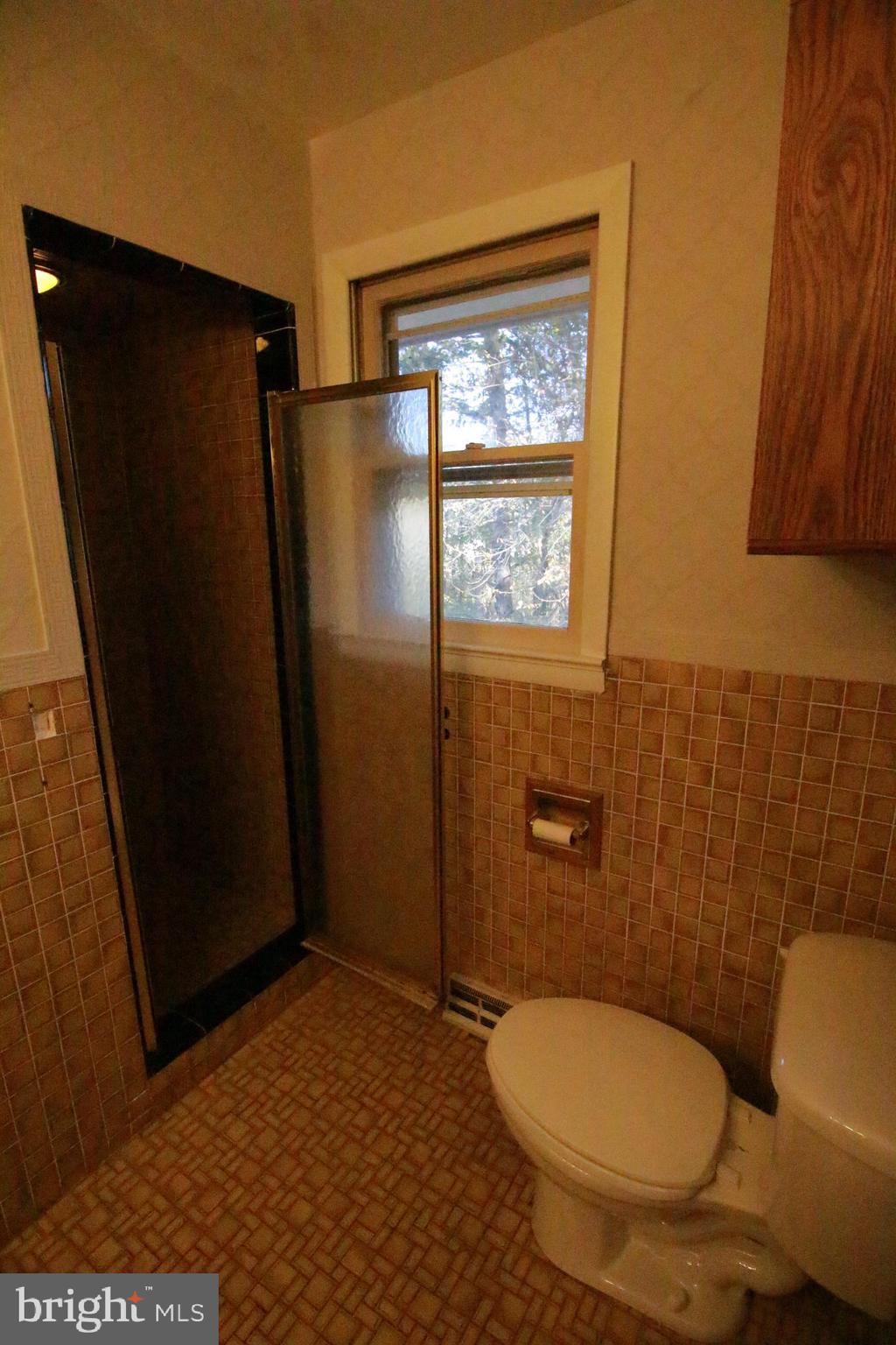424 Trenton Road Browns Mills, NJ 08015 - Photo 75 of 109 a bathroom with a granite countertop toilet and a sink