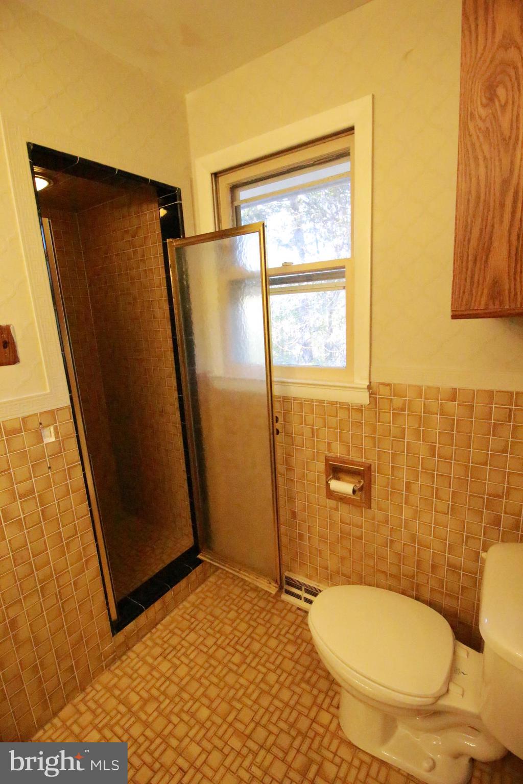 424 Trenton Road Browns Mills, NJ 08015 - Photo 76 of 109 a bathroom with a granite countertop sink toilet and shower