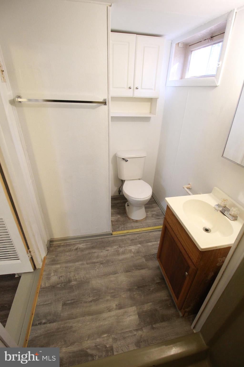 424 Trenton Road Browns Mills, NJ 08015 - Photo 97 of 109 a bathroom with a sink toilet and shower