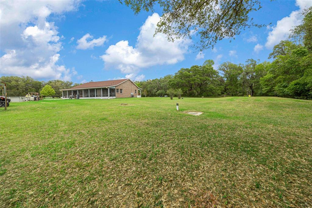 732 Carl Wilson Road Fort White, FL 32038 - Photo 56 of 80 a view of an outdoor space and a yard