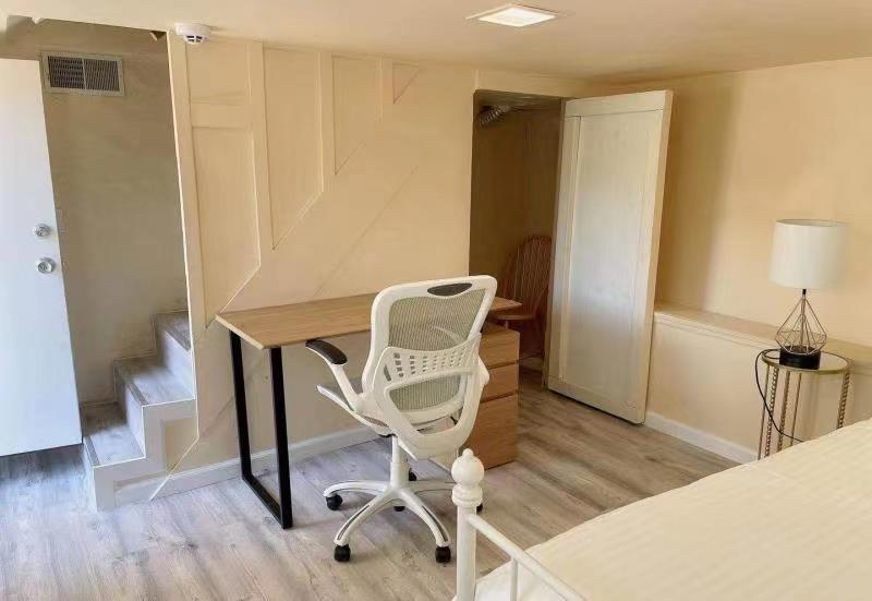 940 Mariposa Street Rodeo, CA 94572 - Photo 10 of 21 a workspace room with furniture and wooden floor
