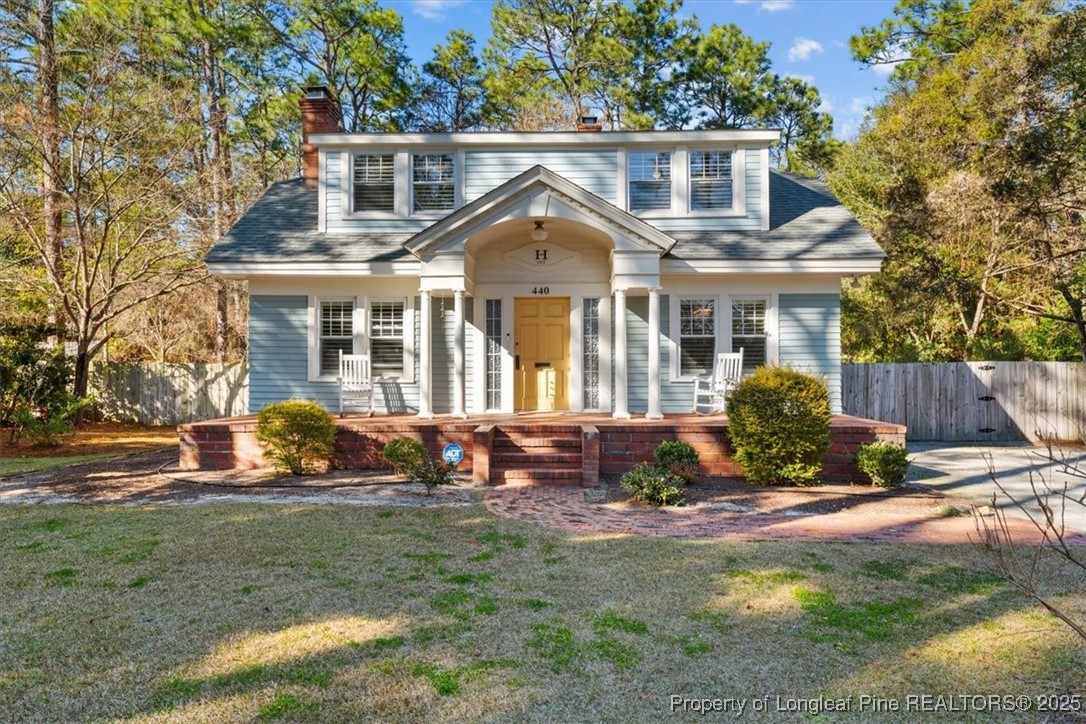 440 Kensington Road Southern Pines, NC 28387 - Photo 1 of 50 a view of a house with yard and sitting area