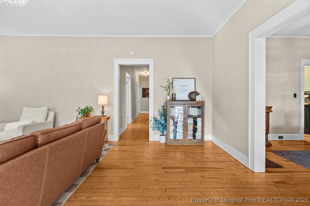 440 Kensington Road Southern Pines, NC 28387 - Photo 14 of 50 a living room with furniture and wooden floor