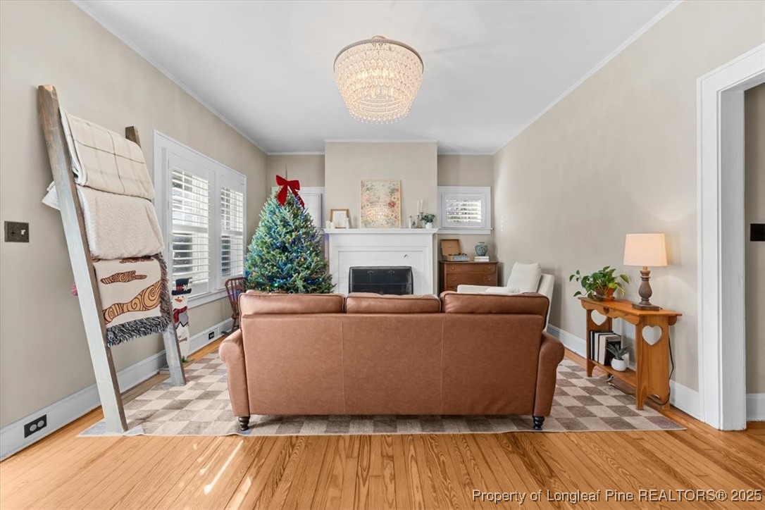 440 Kensington Road Southern Pines, NC 28387 - Photo 15 of 50 a living room with furniture and a fireplace