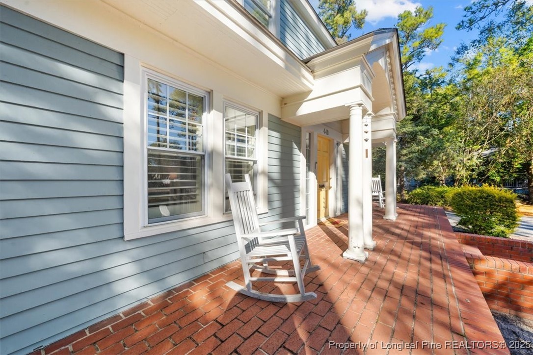 440 Kensington Road Southern Pines, NC 28387 - Photo 2 of 50 a view of a house with backyard and sitting area