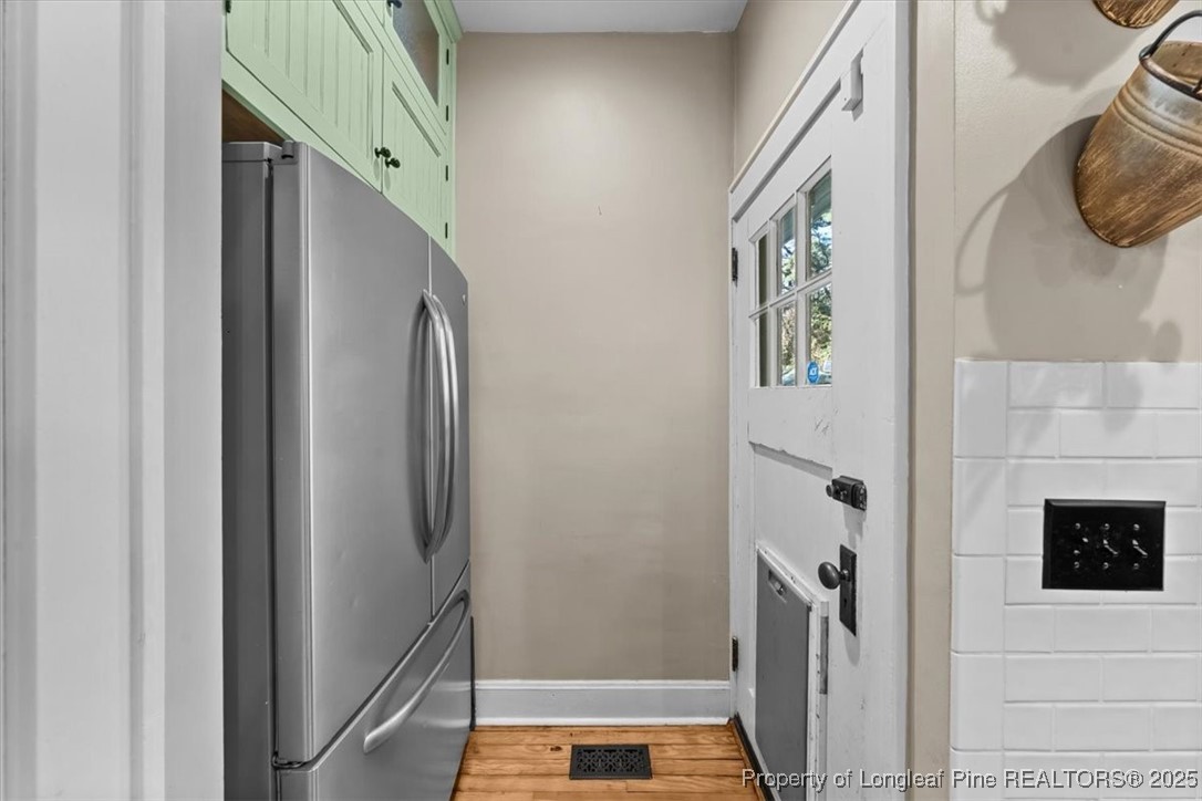 440 Kensington Road Southern Pines, NC 28387 - Photo 23 of 50 a bathroom with a sink and glass door