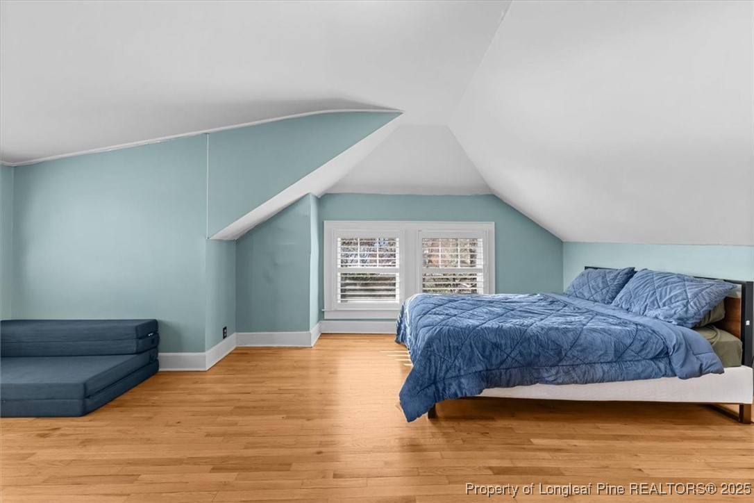 440 Kensington Road Southern Pines, NC 28387 - Photo 29 of 50 a bedroom with a bed and a window