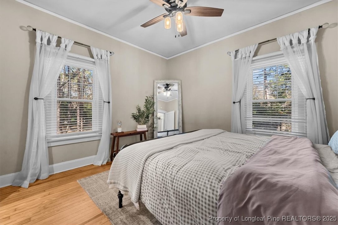 440 Kensington Road Southern Pines, NC 28387 - Photo 38 of 50 a bedroom with a bed and a window