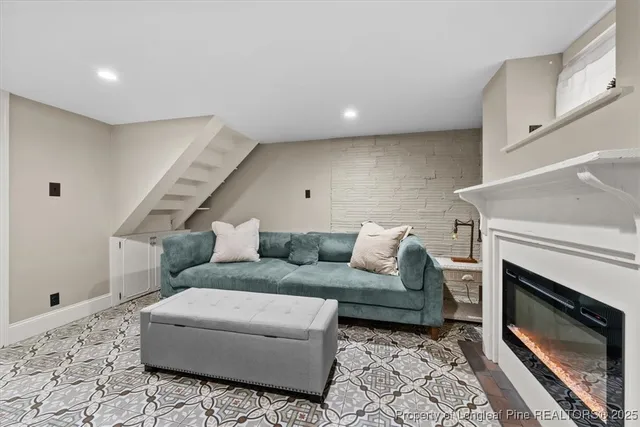 a bedroom with a bed and a mirror