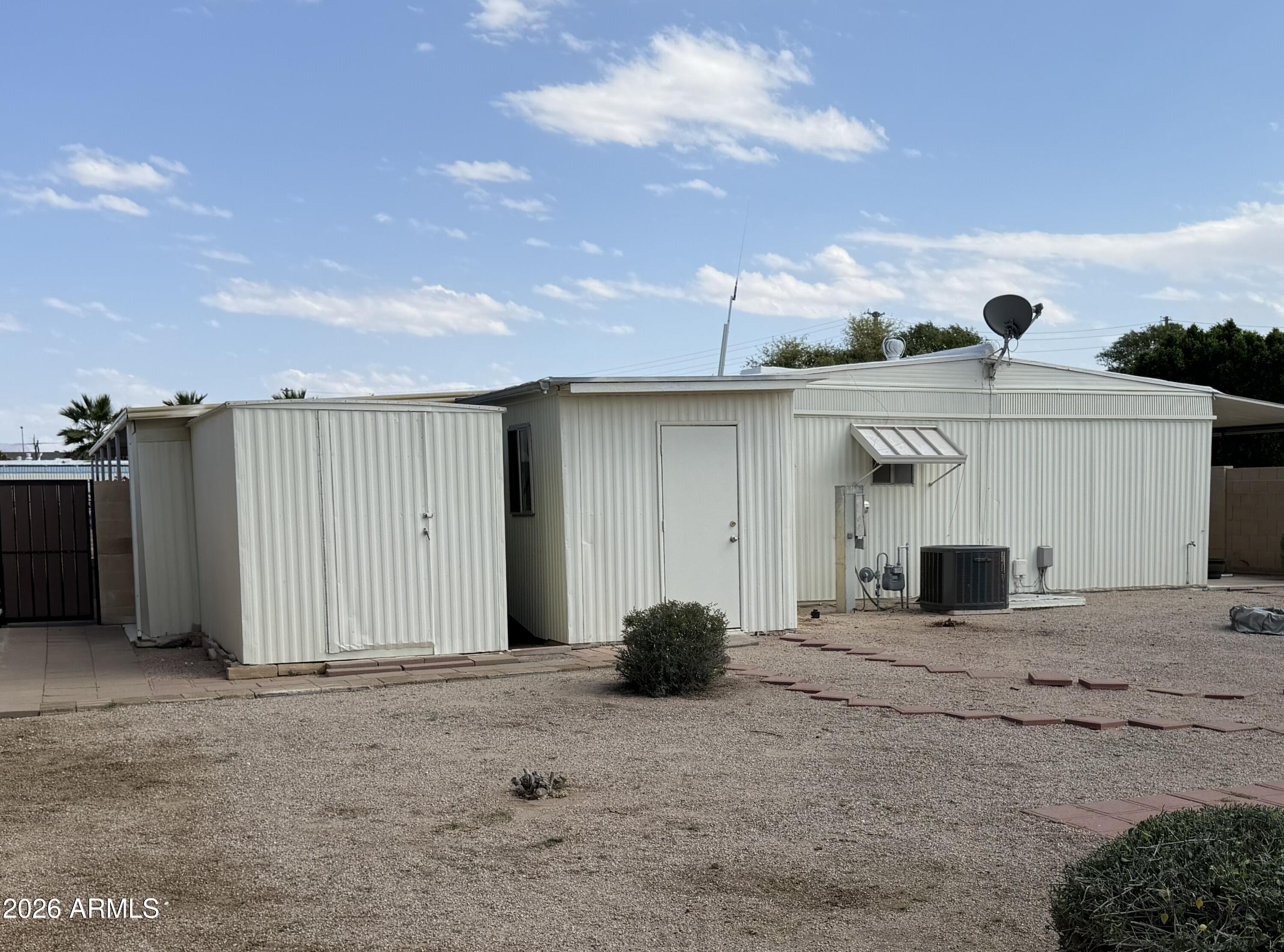 758 South 87th Way Mesa, AZ 85208 - Photo 19 of 24 a view of a house with a yard