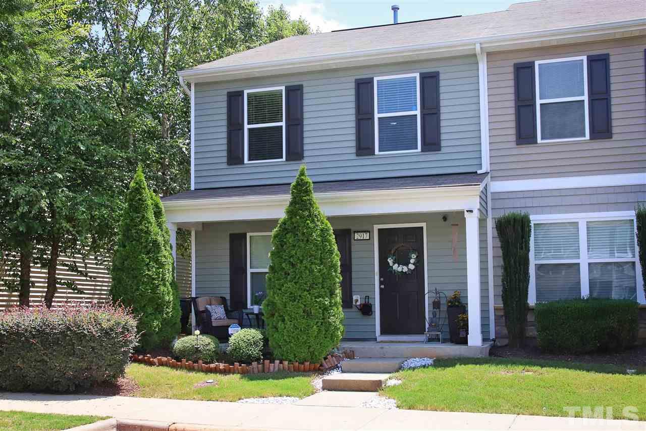 2917 Berkeley Springs Place Raleigh, NC 27616 - Photo 1 of 30 a front view of a house with garden