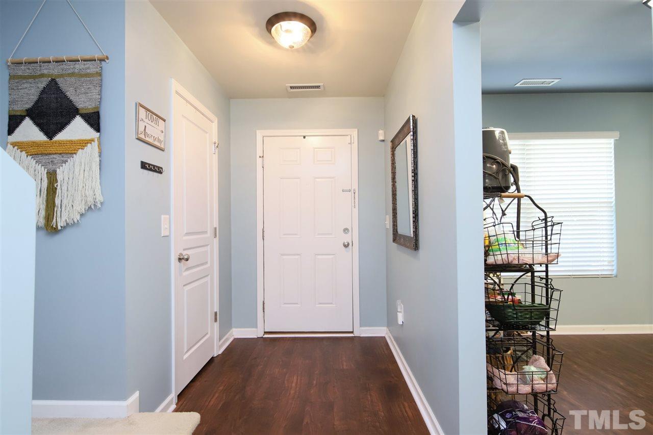 2917 Berkeley Springs Place Raleigh, NC 27616 - Photo 4 of 30 wooden floor in an empty room