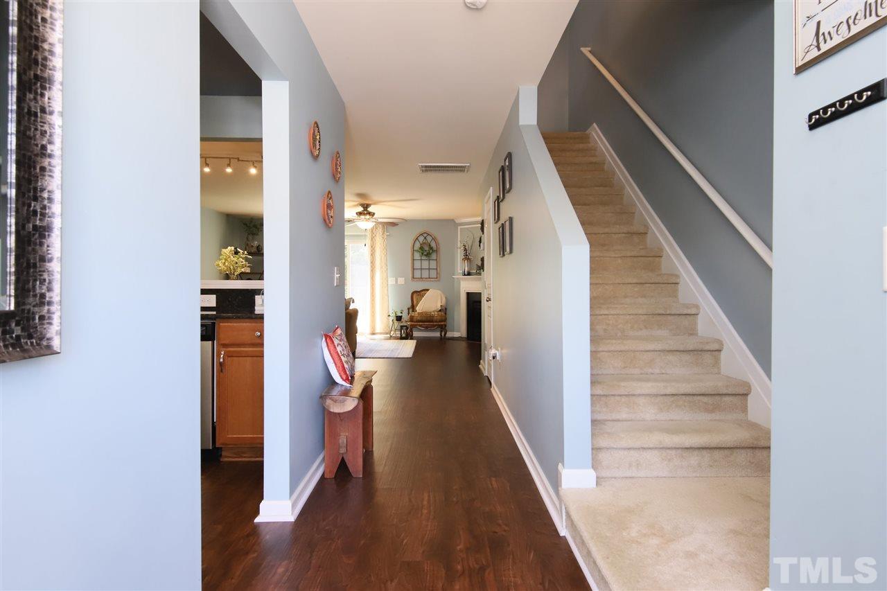 2917 Berkeley Springs Place Raleigh, NC 27616 - Photo 5 of 30 a view of entryway and hall with wooden floor
