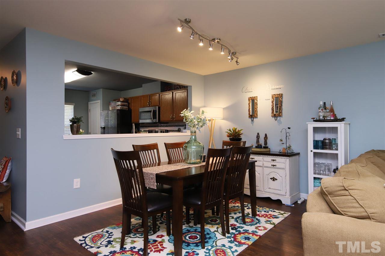2917 Berkeley Springs Place Raleigh, NC 27616 - Photo 10 of 30 a view of a dining room with furniture