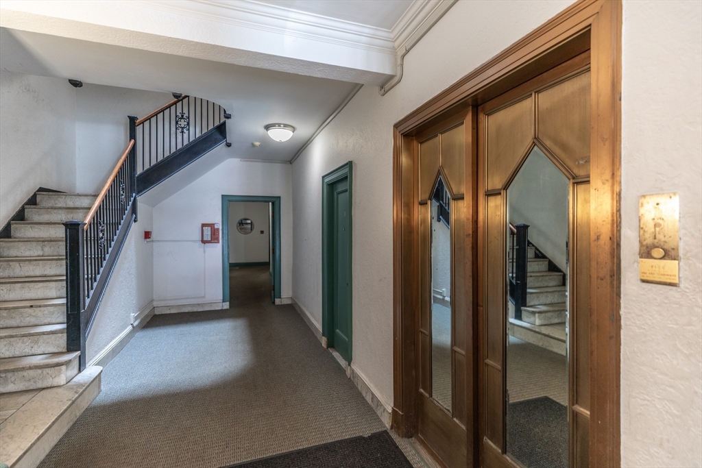 48 Strathmore Road, Unit 26 Boston, MA 02135 - Photo 14 of 15 a view of hallway with stairs