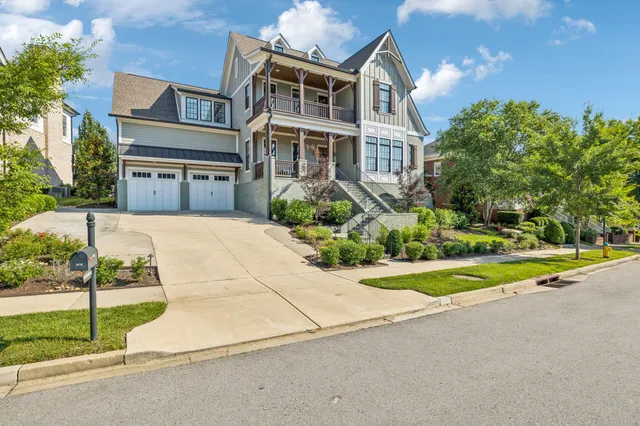 a kitchen with refrigerator and cabinets