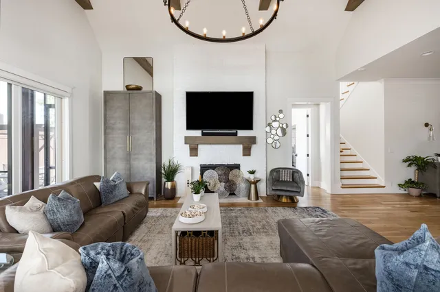 a view of a patio with table and chairs