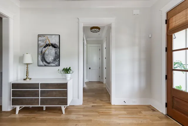 a kitchen with a sink and a stove top oven