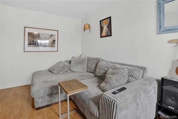 a living room with furniture and a couch