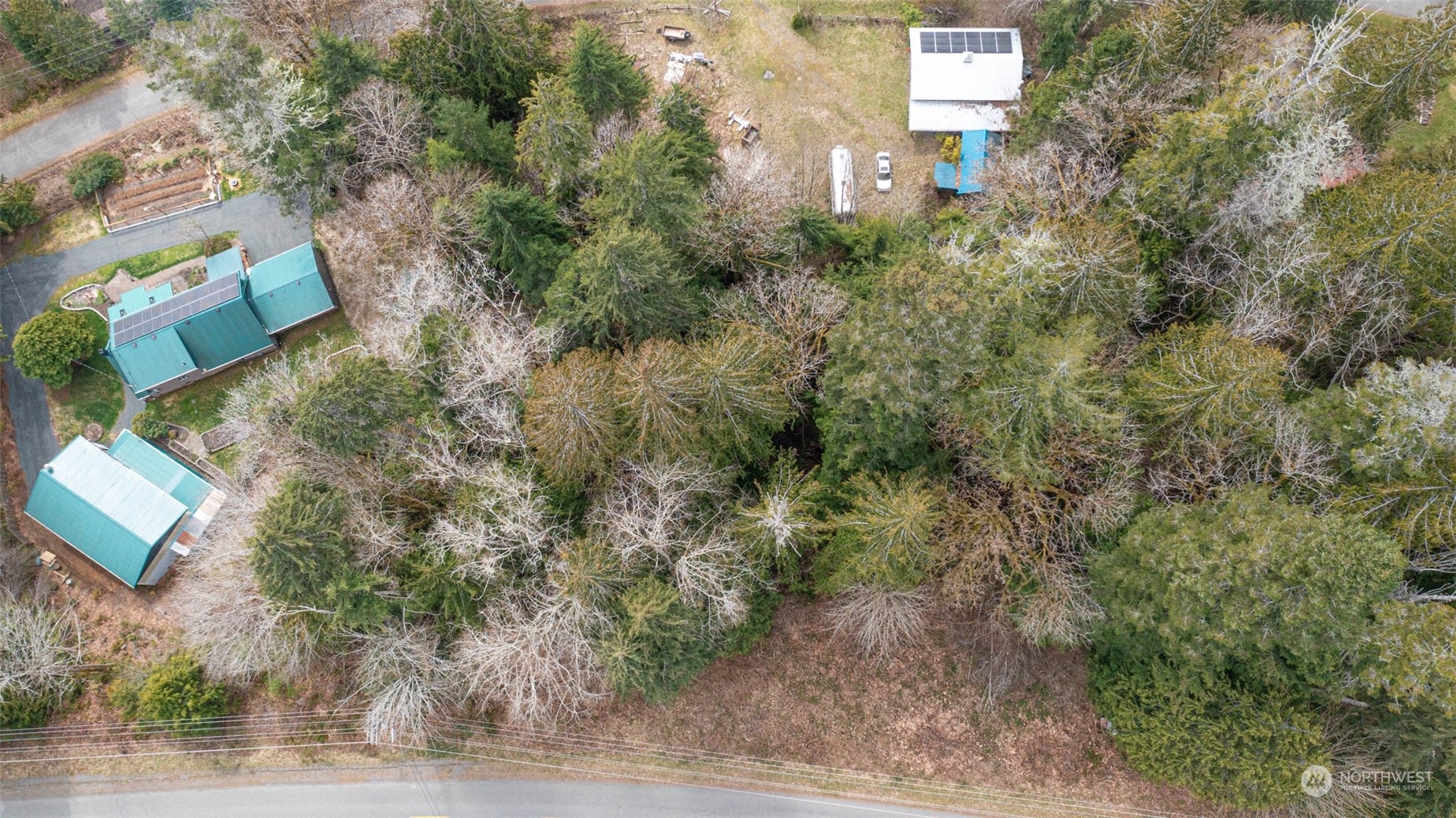 0 Duckabush Road Brinnon, WA 98320 - Photo 1 of 13 an aerial view of houses with yard