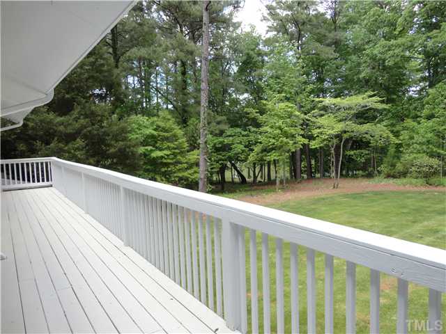 8804 Katharina Court Raleigh, NC 27613 - Photo 11 of 22 a view of a wooden deck