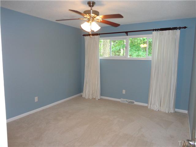 8804 Katharina Court Raleigh, NC 27613 - Photo 14 of 22 a view of an empty room with a window