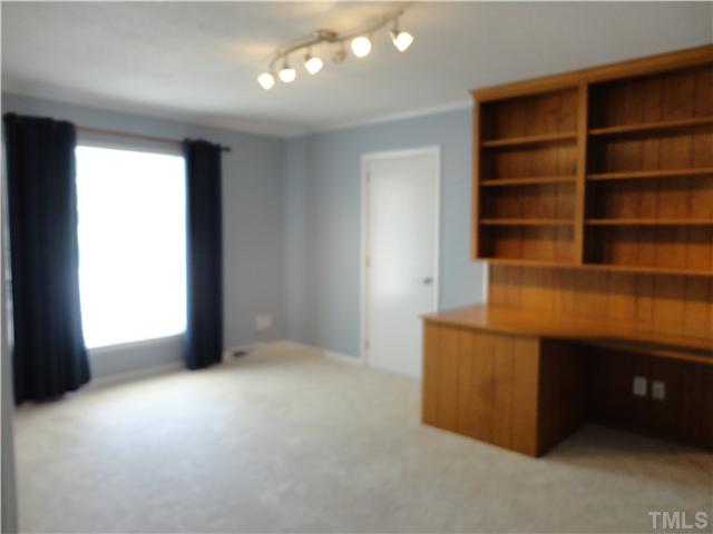 8804 Katharina Court Raleigh, NC 27613 - Photo 15 of 22 a view of an empty room with a window