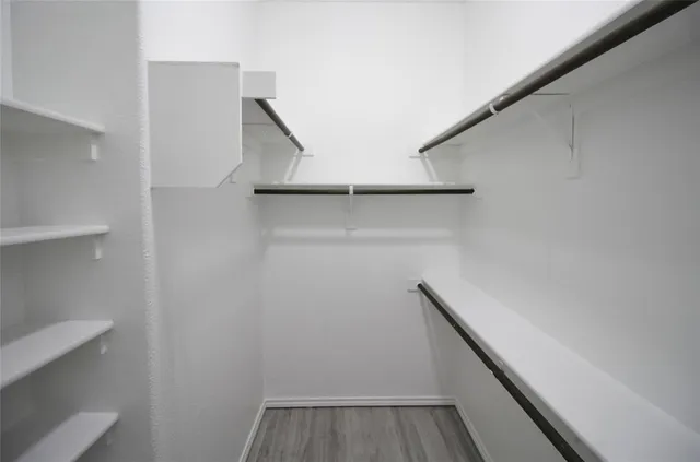 a view of small space with racks on the wall