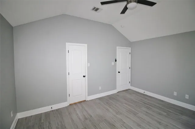 a view of room with hardwood floor