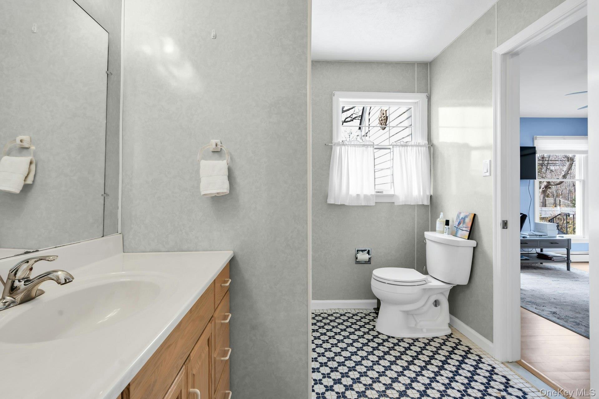 5845 North Bayview Road Southold, NY 11971 - Photo 10 of 26 Ensuite bathroom conveniently connected to the laundry room and first floor bedroom/office space