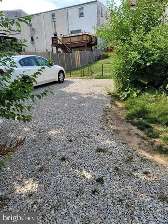 a view of a backyard with a area