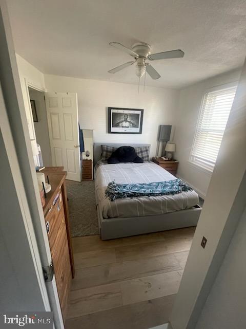 525 Spring Mill Avenue Conshohocken, PA 19428 - Photo 8 of 10 a bedroom with a bed and a mirror