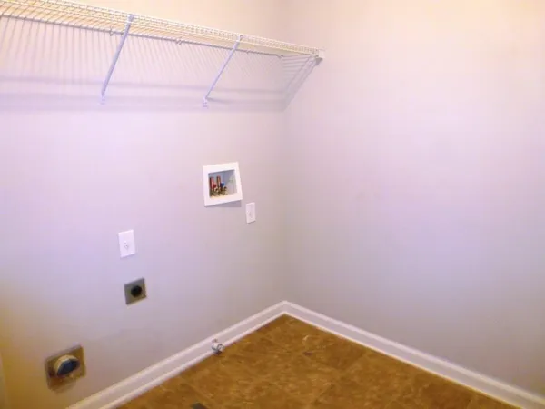 a bathroom with a small window