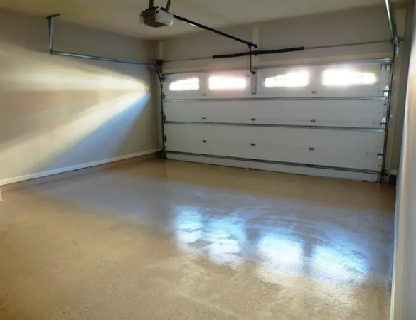 a view of a ceiling fan and window