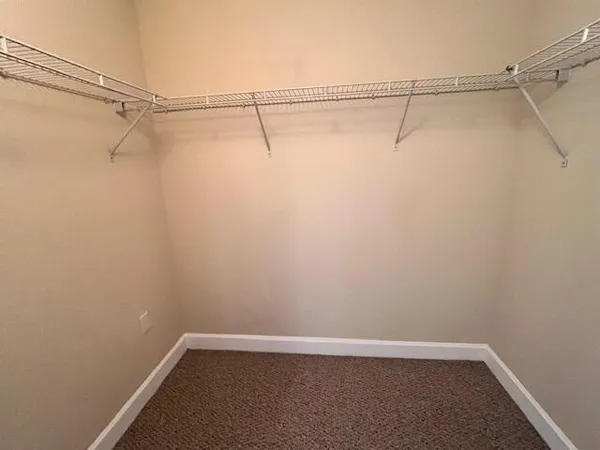 a view of a room with racks on the wall