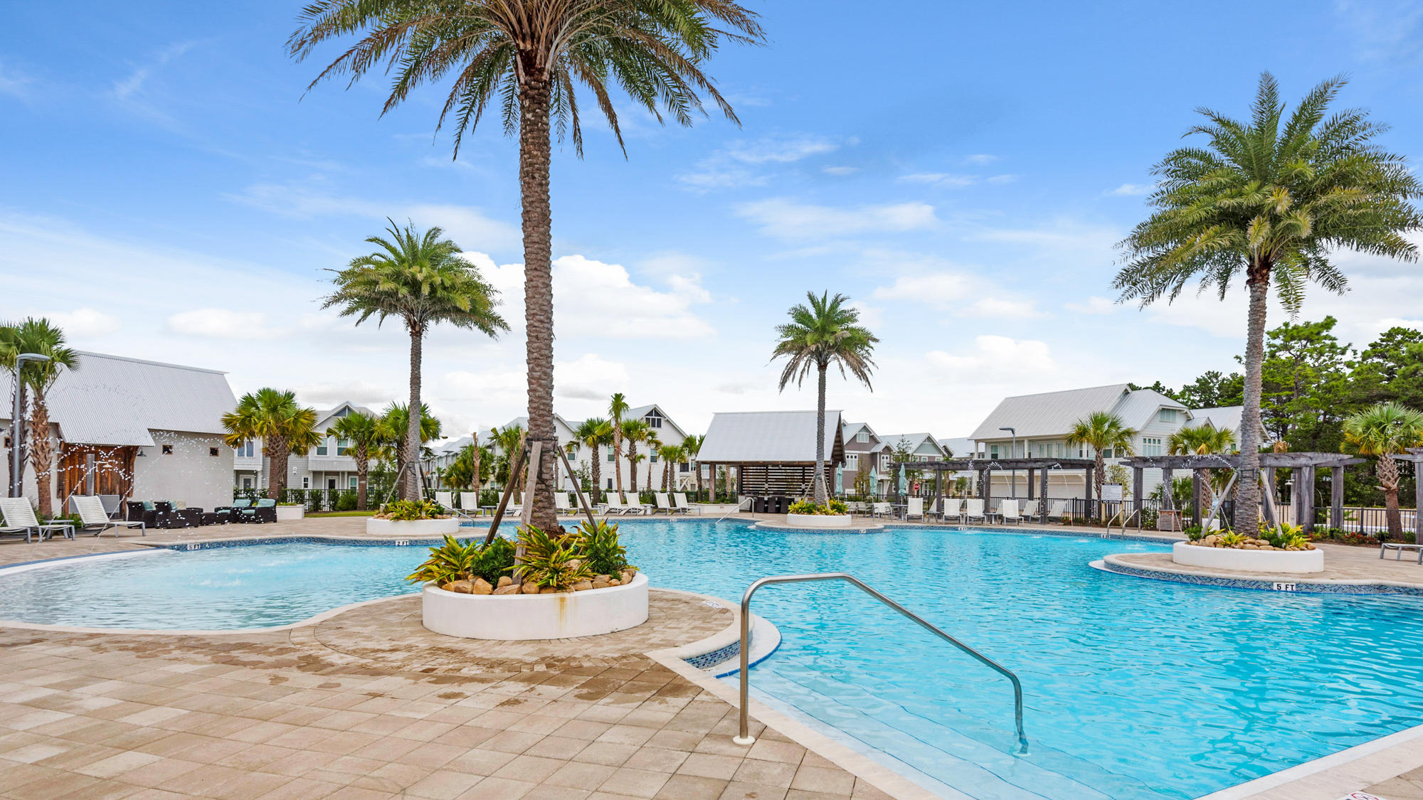 51 Dune Comet Lane, Unit A Panama City Beach, FL 32461 - Photo 31 of 63 a view of a swimming pool and a terrace