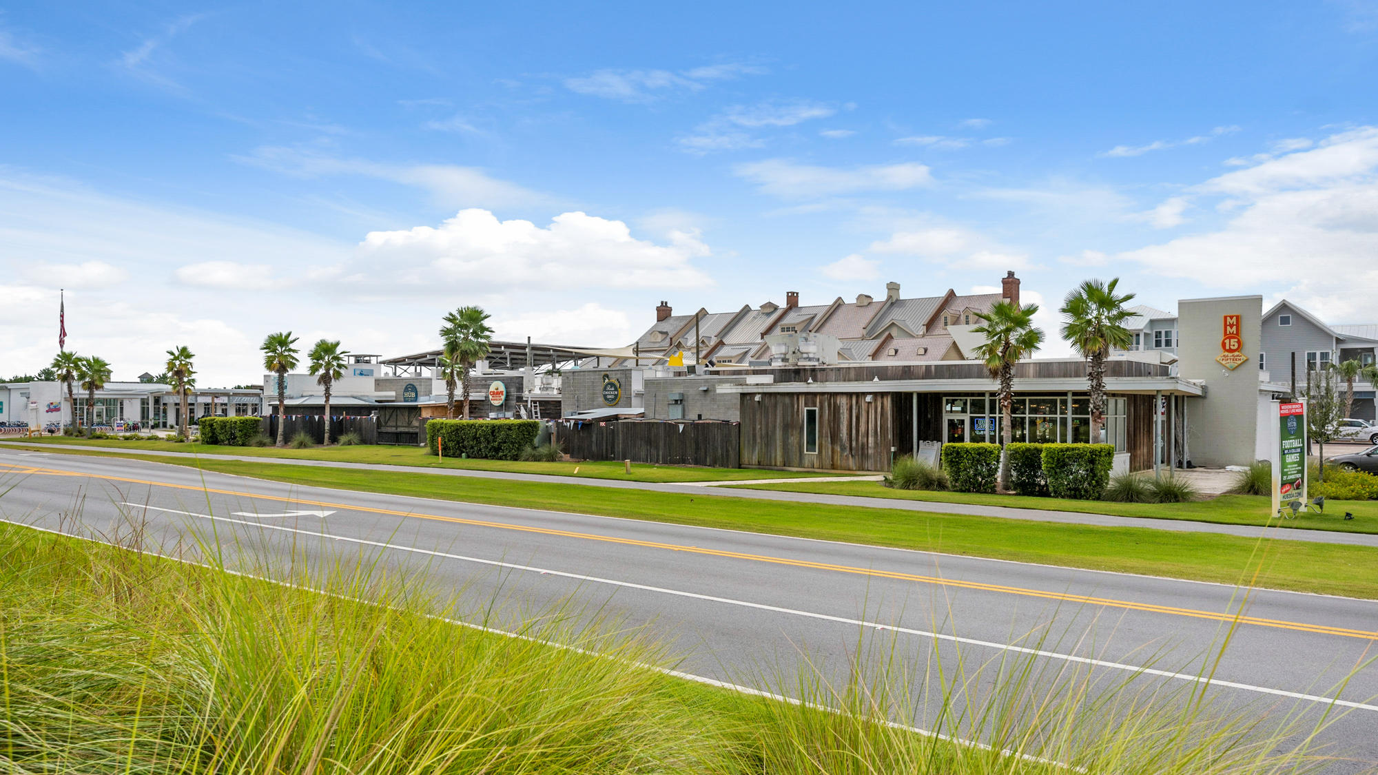 51 Dune Comet Lane, Unit A Panama City Beach, FL 32461 - Photo 44 of 63 a view of a swimming pool and a big yard