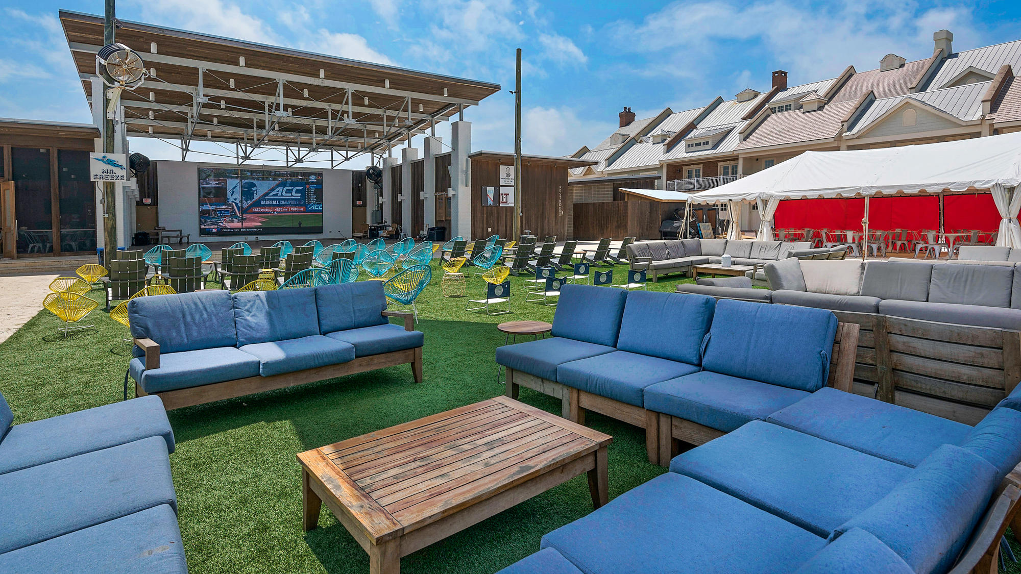 51 Dune Comet Lane, Unit A Panama City Beach, FL 32461 - Photo 48 of 63 a view of a backyard with furniture and a grill