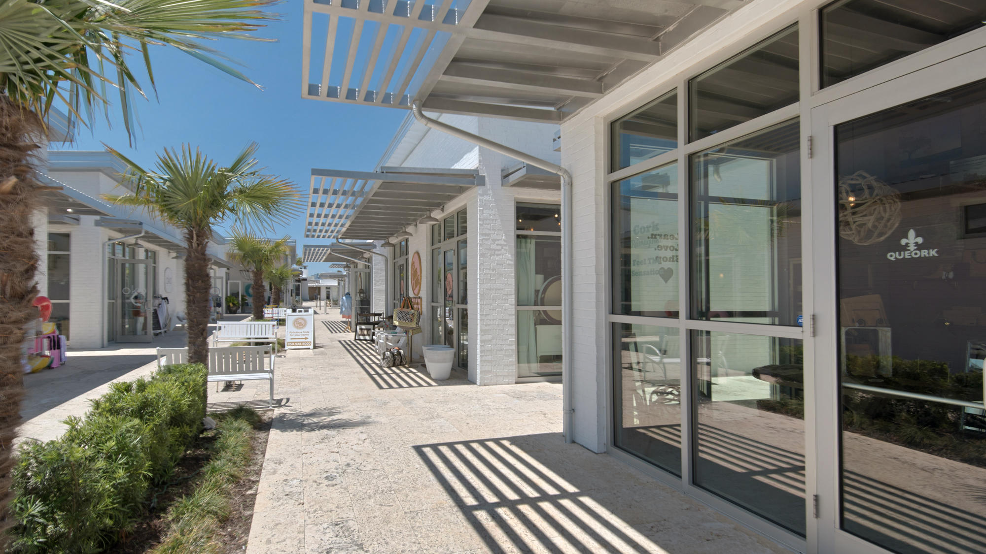 51 Dune Comet Lane, Unit A Panama City Beach, FL 32461 - Photo 57 of 63 a view of a patio with table and chairs and potted plants