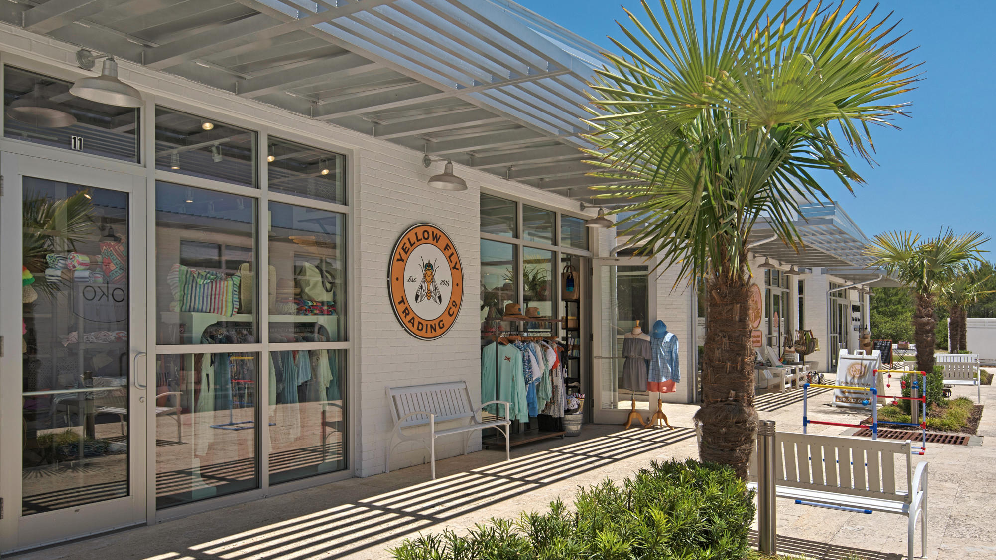 51 Dune Comet Lane, Unit A Panama City Beach, FL 32461 - Photo 58 of 63 a front view of a house with a tree