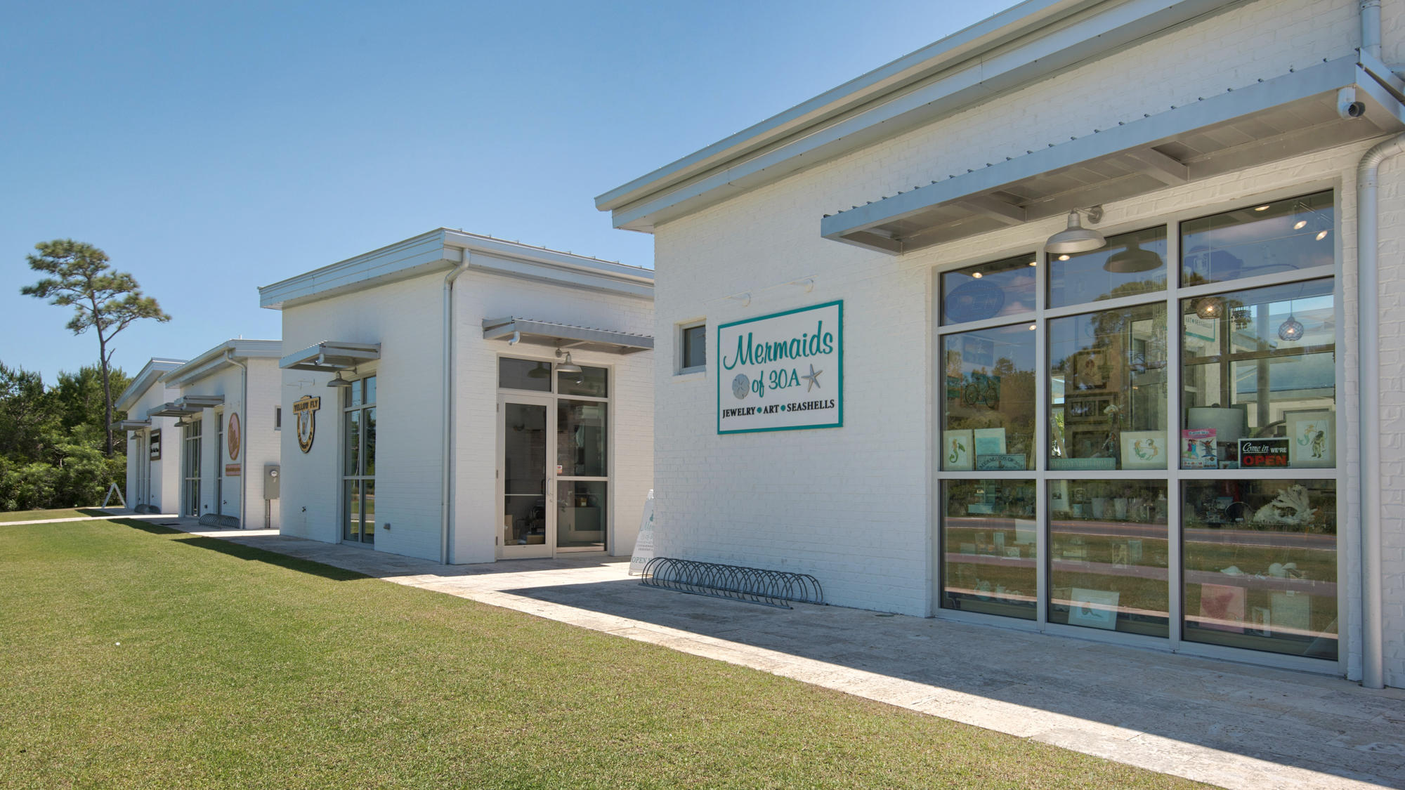 51 Dune Comet Lane, Unit A Panama City Beach, FL 32461 - Photo 60 of 63 a view of a house with a porch