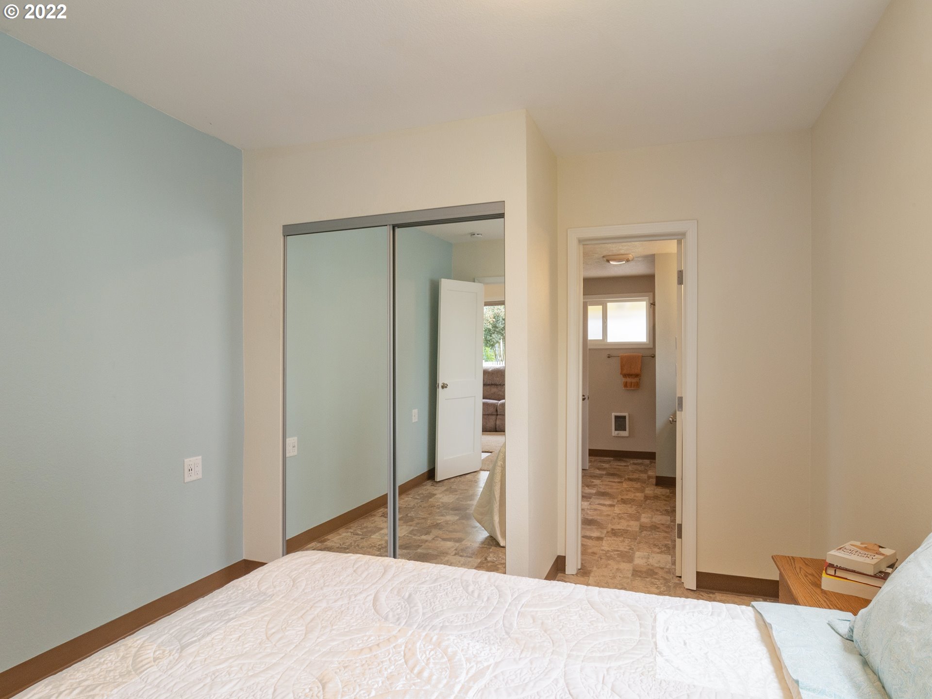 1340 E Street Springfield, OR 97477 - Photo 20 of 32 a bedroom with a bed and a bathroom